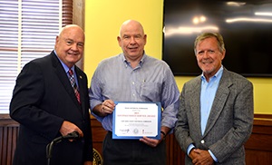 Pictured L to R: Fort Bend County Judge Bob Hebert, and Fort Bend County Historical Commission Members/Volunteers Charles Kelly and Don Brady