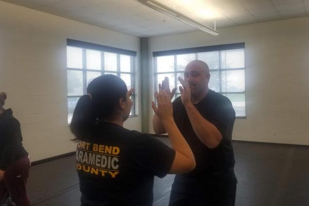 Employees training in self-defense