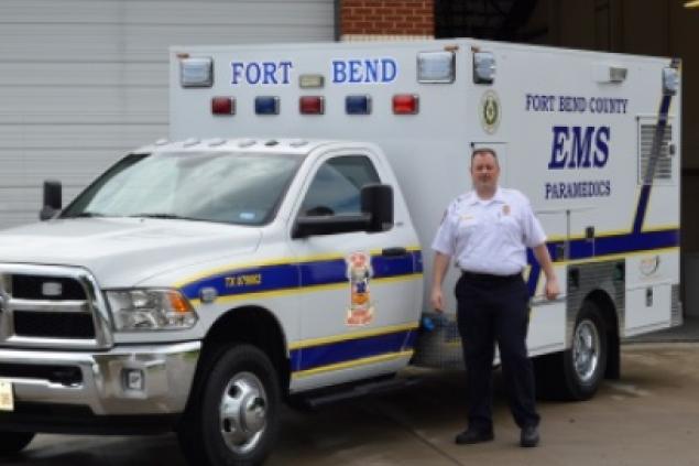 Chief Temple inspecting the new look for EMS units.